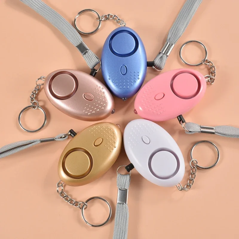 Personal Alarm Keychain - 130db alarme d'auto-défense Anti-loup fille enfant